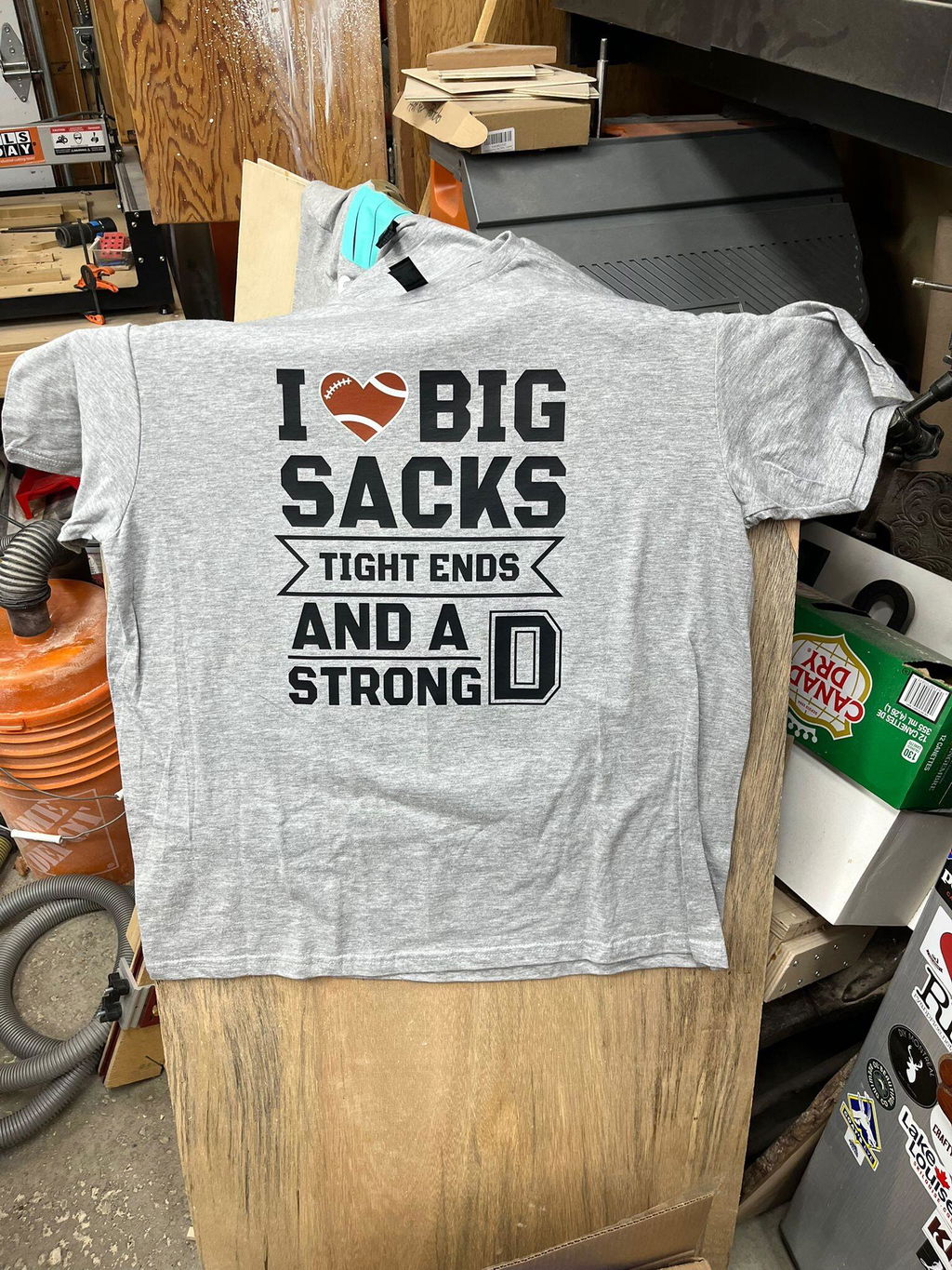 Grey t-shirt printed I love Big Sacks, tight ends and a strong D, from a customer review
